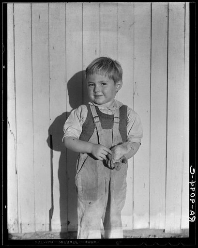 Youngest child of four of rural rehabilitation client. Father assisted in establishing poultry farm. Loan successful. Near San Fernando, California
