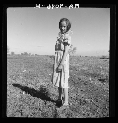 Resettled child of Bosque Farms, New Mexico. She herds cows for neighboring families for five cents per day