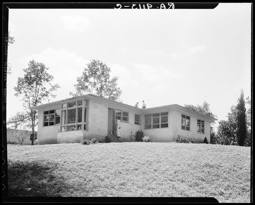 Hightstown, New Jersey. The model house nears completion. Note landscaping