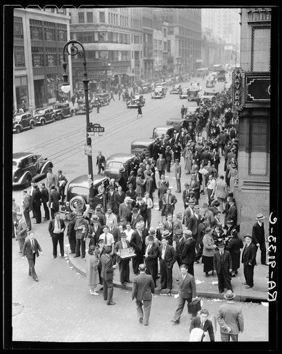 Background for Hightstown project photographs. Seventh Avenue and West 28th Street, New York. Garment workers leave the factories for noon hour