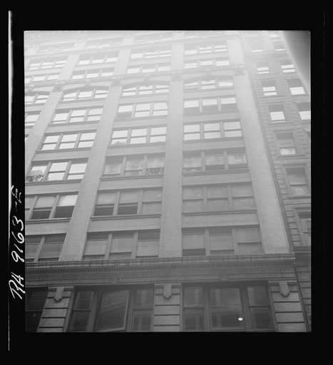 Background photgraph for Hightstown project. Garment factory on West Twenty-first Street, New York City. Mr. Jacob Solomon, one of the two hundred and fifty selected family heads for the Hightstown Project, is employed in this building. Compare with factory built by Resettlement Administration at Hi
