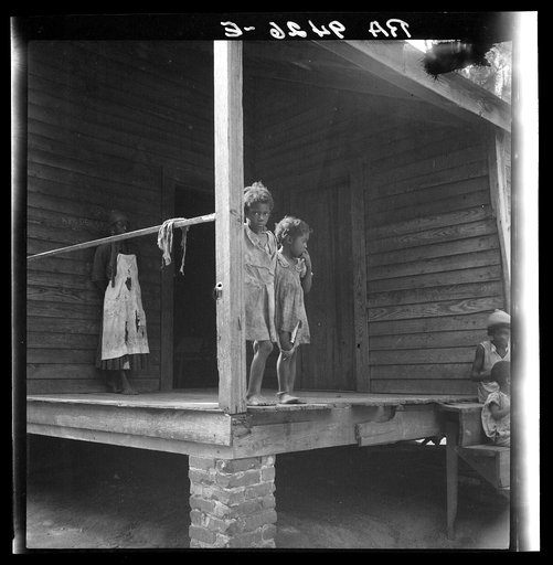 Children of turpentine worker near Cordele, Alabama. The father earns one dollar a day