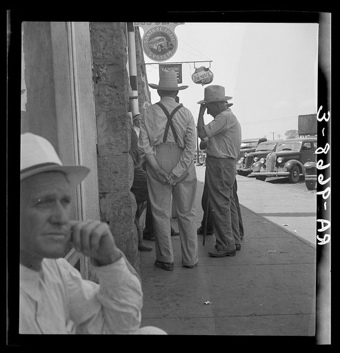 Farmers on main street discussing drought. Sallisaw, Sequoyah County, Oklahoma