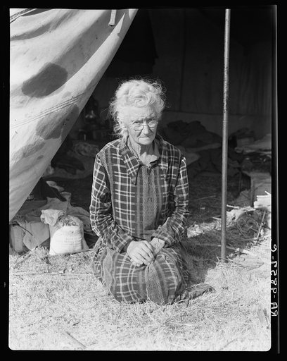 Grandmother of twenty-two children, from a farm in Oklahoma; eighty years old. Now living in camp on the outskirts of Bakersfield, California. "If you lose your pluck you lose the most there is in you - all you've got to live with"