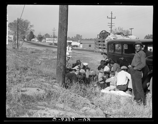 Mexicans bound for the Imperial Valley to harvest peas. Near Bakersfield, California