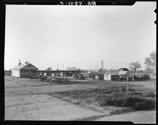View of Kern migrant camp showing outdoor clubroom with protection from the sun. California