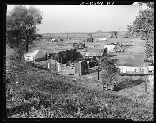 Migrant camp on the outskirts of Sacramento, California on the American River. About thirty families lived on this flat
