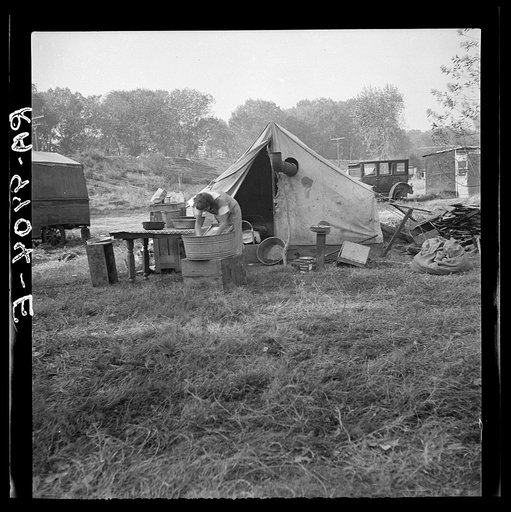 American River camp, Sacramento. Home of Tennessee family, now migratory workers. Seven in family, came to California July 1935, following relatives who had come in 1933. Father was a coal miner in Tennessee. Reason for coming to California. "Our neighbors were coming. We only got one or two days wo