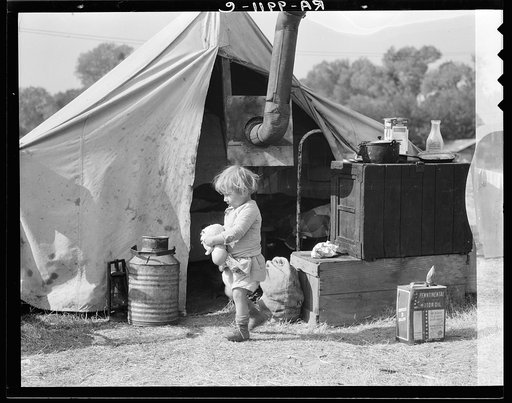 Child of migratory worker. American River camp near Sacramento, California