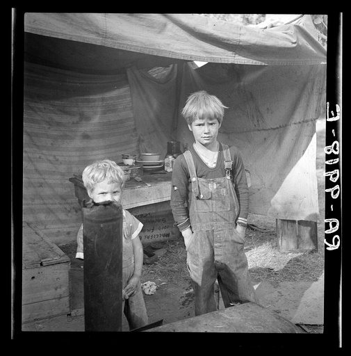 Children of destitute family. American River camp, near Sacramento, California
