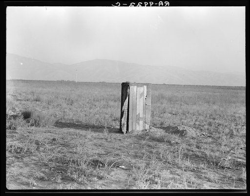 Sanitary facilities for migratory workers. Ditch bank camp. Squatters near Arvin, Kern County, California