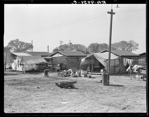 Housing for migratory cotton workers five miles north of Corcoran, California. The famous strikers' concentration camp in 1933 was in Corcoran
