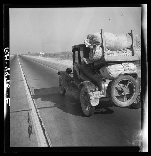 Drought refugee's car on U.S. Highway 99 between Bakersfield and Famoso, California. Note: the photographer passed twenty-eight cars of this type (drought refugees) between Bakersfield and Famoso, thirty-five miles, between 9:00 and 9:45 in the morning