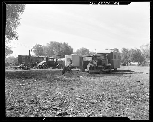 Squatter camp. Outskirts of Bakersfield, California. Note number of auto trailers and trailer being constructed on left