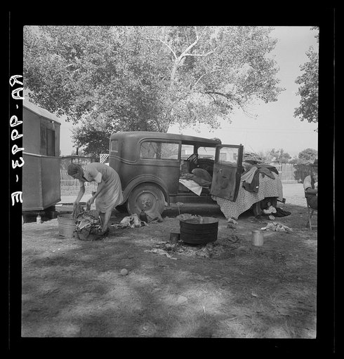 Wife of migratory worker in auto camp. California
