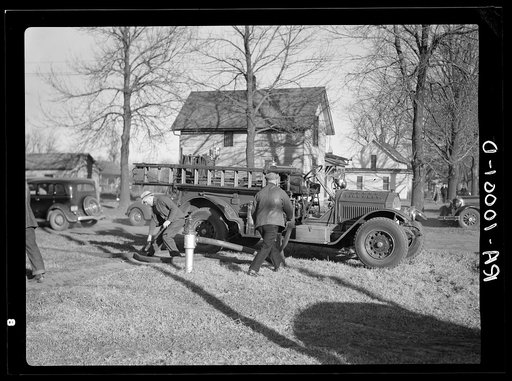 Smalltown volunteer fire department at work. Aledo, Illinois