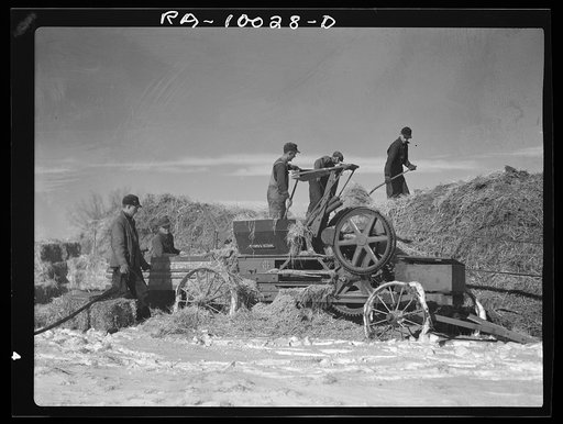 Farmers baling straw. Clay County, Iowa