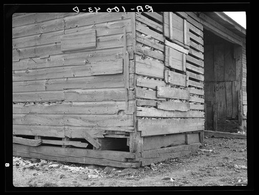 Detail of corn crib on Nelson brothers' farm showing need for repairs and paint. Owned by fraternal order, American Order of United Workmen, Des Moines, Iowa. Crop share lease