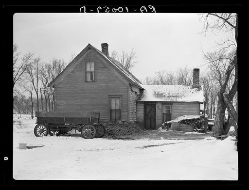 House on fifty-seven acre farm rented by Edmond Williams. The house is banked with manure to keep out the cold. This is common practice in Iowa and the thickness of the manure bank is in direct proportion to the disrepair of the house. This is unusually thick. Tenant does not have to lease, but work