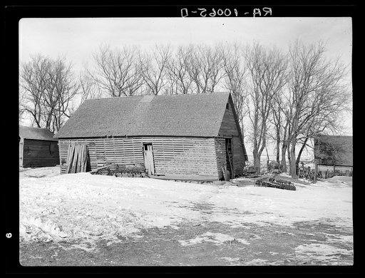 Corn crib on Edgar Allen's farm near Milford, Iowa. One hundred sixty acres owned by private party, crop share basis lease