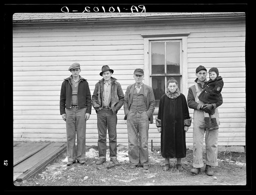 Part of family of Charles H. Mitchell, sixty-three years old. Mitchell has rented farms in the past but, because of inability to get a farm, worked as hired hand. Sons have been able to find but very little work. Family is on unemployment relief in Estherville, Iowa