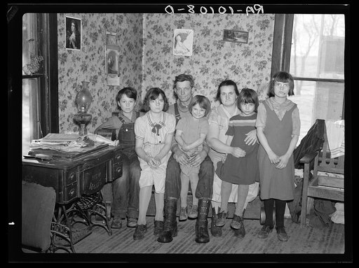 Edgar Allen, wife, and children. They are tenants of private party on one hundred sixty acre farm near Milford, Iowa. Crop share lease, two-fifths of all crops and two hundred dollars rent. This is an extreme case of poverty in northwest Iowa. Children are very smart and seemingly very happy