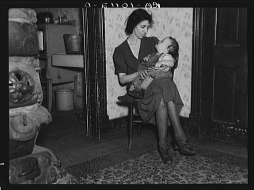 Wife of Homer Sharer and the baby, one of five children. Former tenant farmers and hired hands. They are now living on unemployment relief in Estherville, Iowa
