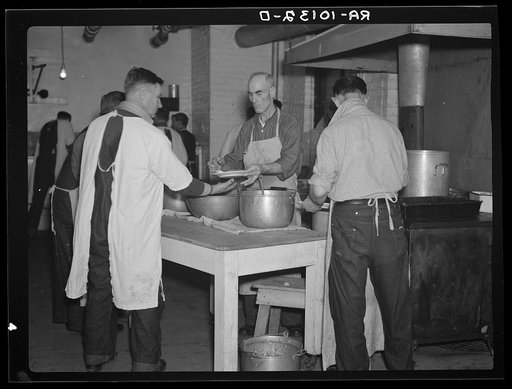Inmates working in the kitchen of homeless men's bureau. Sioux City, Iowa