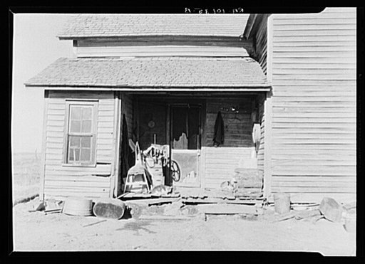 Backporch of farmhouse on J.H. and Ellis Cline's one hundred and eight acre farm which they rent from an estate. Northeastern corner of Ringgold County, Iowa