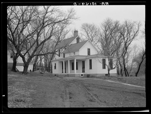 Farmhouse on the heavily mortgaged farm of Theodore F. Frank. The family is practically destitute, near Anthon, Iowa. Frank formerly owned this farm, and built it up by himself until pressure of drought and depression necessitated mortgaging of land to a loan company into whose hands it has now pass