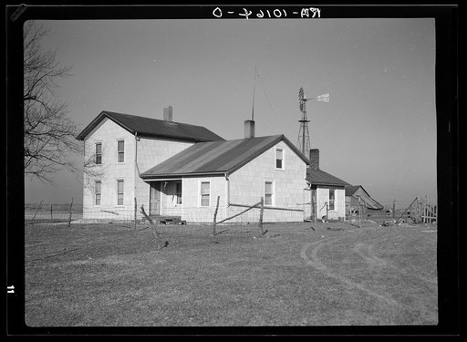 House on Frank Armstrong's farm near Marseilles, Illinois. Armstrong rents one hundred twenty acre farm from landlord who is interested in building up his farm. This farmhouse has asbestos siding