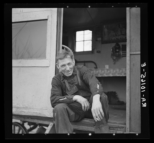 Drunken fisherman in front of his trailer home. Ottawa, Illinois
