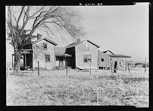 Abandoned farm home on George Erickson's one hundred twenty acre farm near Seneca, Illinois. The land is being farmed by owner
