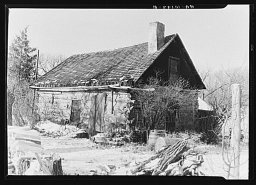 Log cabin on William Ballou's farm near Marseilles, Illinois. This cabin was built in 1866 by a Mr. Bates who made sulphur matches here. He was driven away by the government