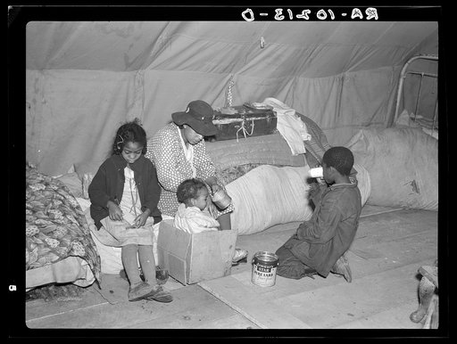 Flood refugees at mealtime. Near Charleston, Missouri