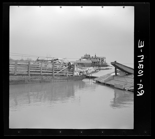 A large load of household goods which has been moved from the path of the flood. Moored at the levee in New Madrid, Missouri
