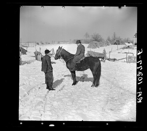 A neighbor comes to talk about selling his horse to Oscar Gaither, tenant farmer near McLeansboro, Illinois