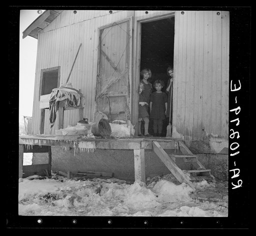 The back porch of Oscar Gaither's farmhouse near McLeansboro, Illinois