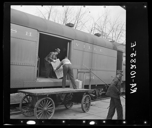 Unloading express from train. Mount Vernon, Indiana