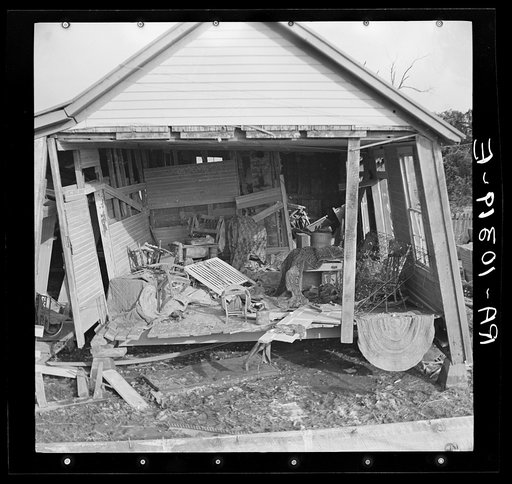 Side of house torn away by flood, showing damaged interior of house. Black Township, Posey County, Indiana