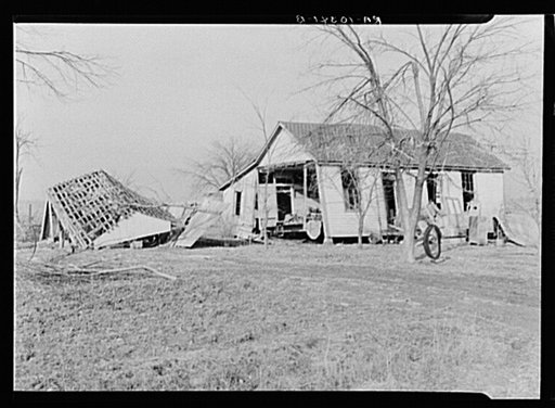 Farmhouse and outbuildings ruined by flood. Posey County, Indiana