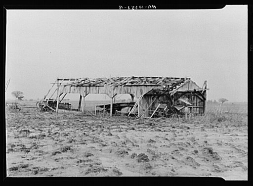 Indiana farmland and machine shed after the flood. Posey County, Indiana