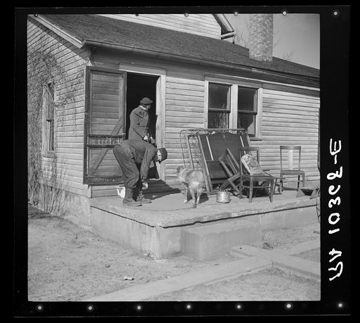 Mr. and Mrs. Shoemaker, tenant farmers, who are moving from their farm near Shadeland, Indiana