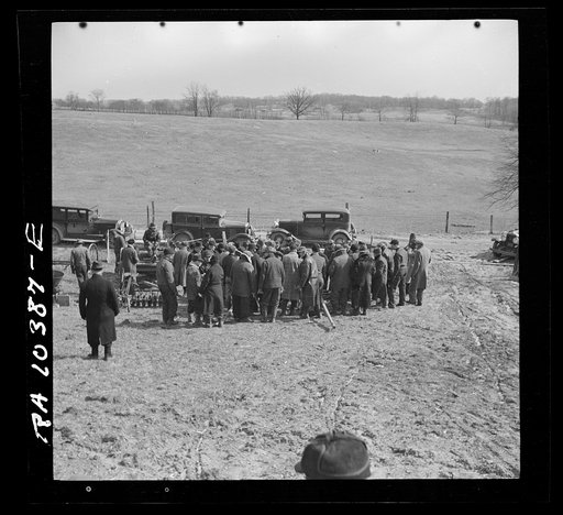 Farmers at the closing-out sale of Frank Sheroan, tenant farmer. Near Montmorenci, Indiana