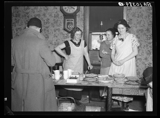 Lunch was served in the farmhouse by neighbor ladies during Frank Sheroan's closing-out sale. Montmorenci, Indiana