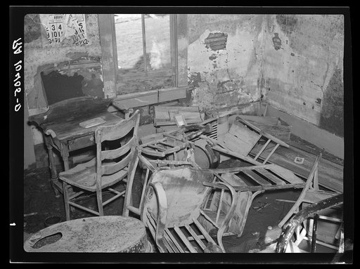 The living room in an Indiana farmhouse after the flood. Posey County
