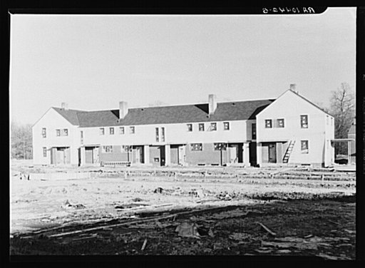 Stucco house with brick trim and slate roof. Greenhills, Ohio