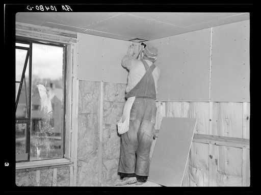Installing wallboard in a house. Greenhills project, Ohio