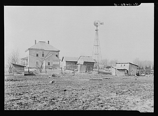 House and outbuildings on William Weltis' farm near Boswell, Indiana. This fourteen hundred acre farm is owner-operated under a heavy mortgage