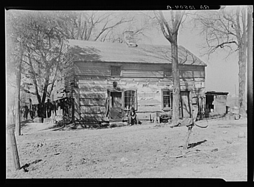 House on the farm rented by Erasty Emvich. Near Battlefield, Indiana. Emvich repaired this house at his own expense when he moved in. There were no windows or doors and the roof had holes three feet wide. He also built a barn, dug a fruit cellar, and put in one hundred rods of fence--all at his own 